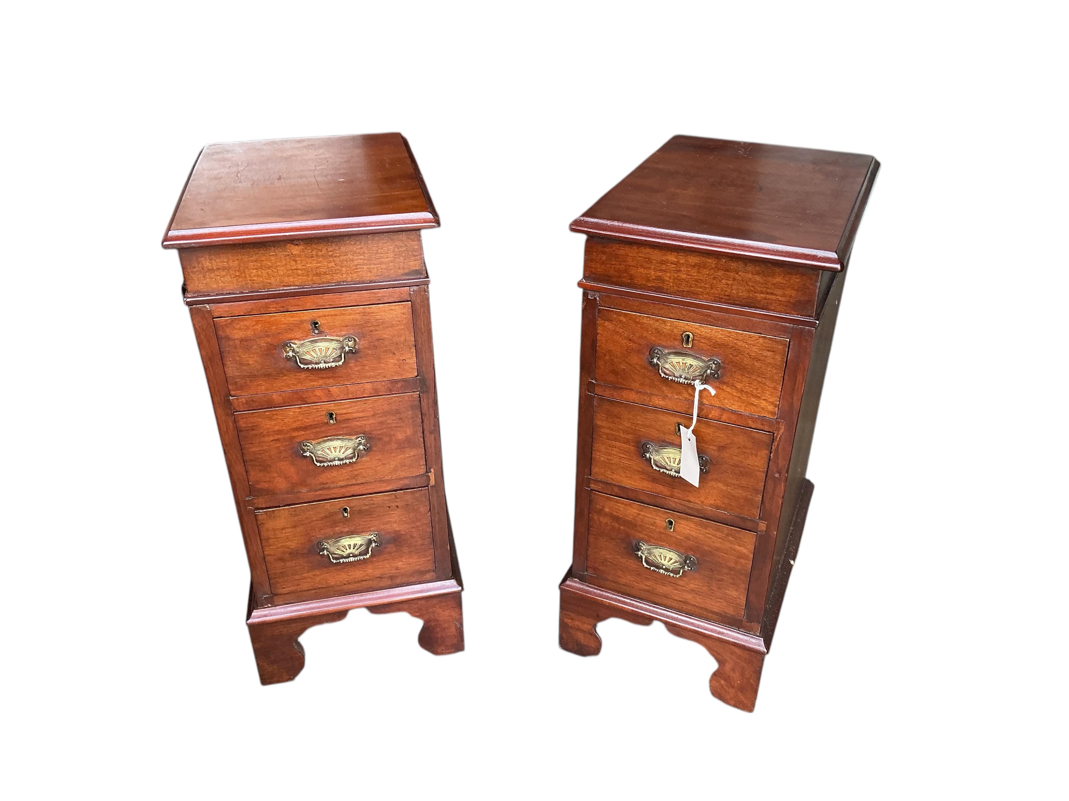 A pair of Victorian style mahogany three drawer bedside chests, width 30cm, depth 40cm, height 68cm